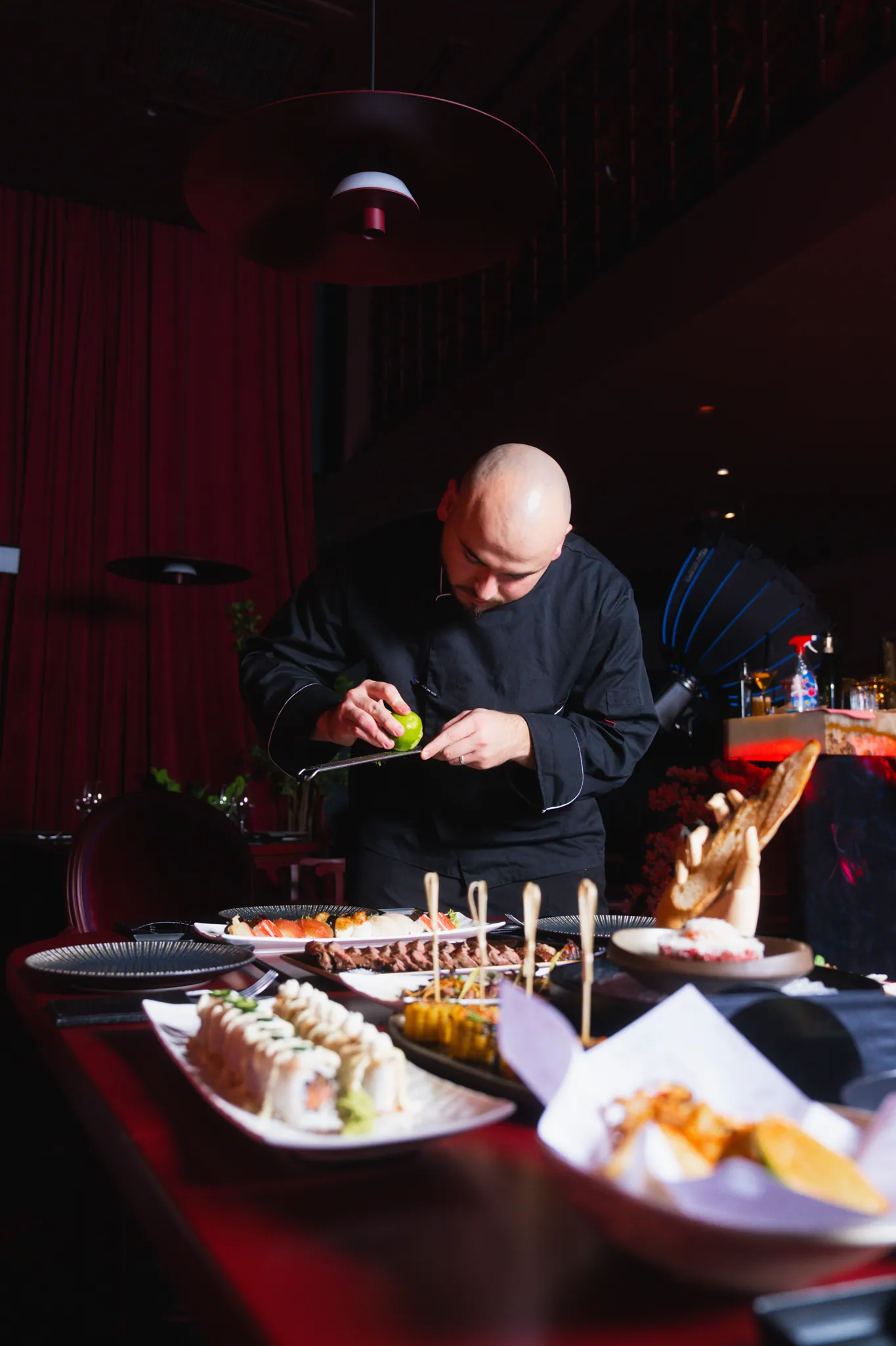 A dish being finished in the NOYA kitchen